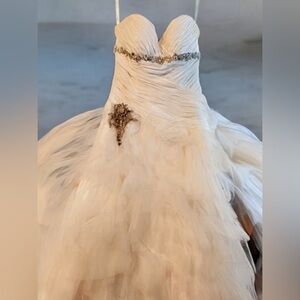 Winnie Couture Elegant White Strapless wedding Gown with crystal Floral Accent.